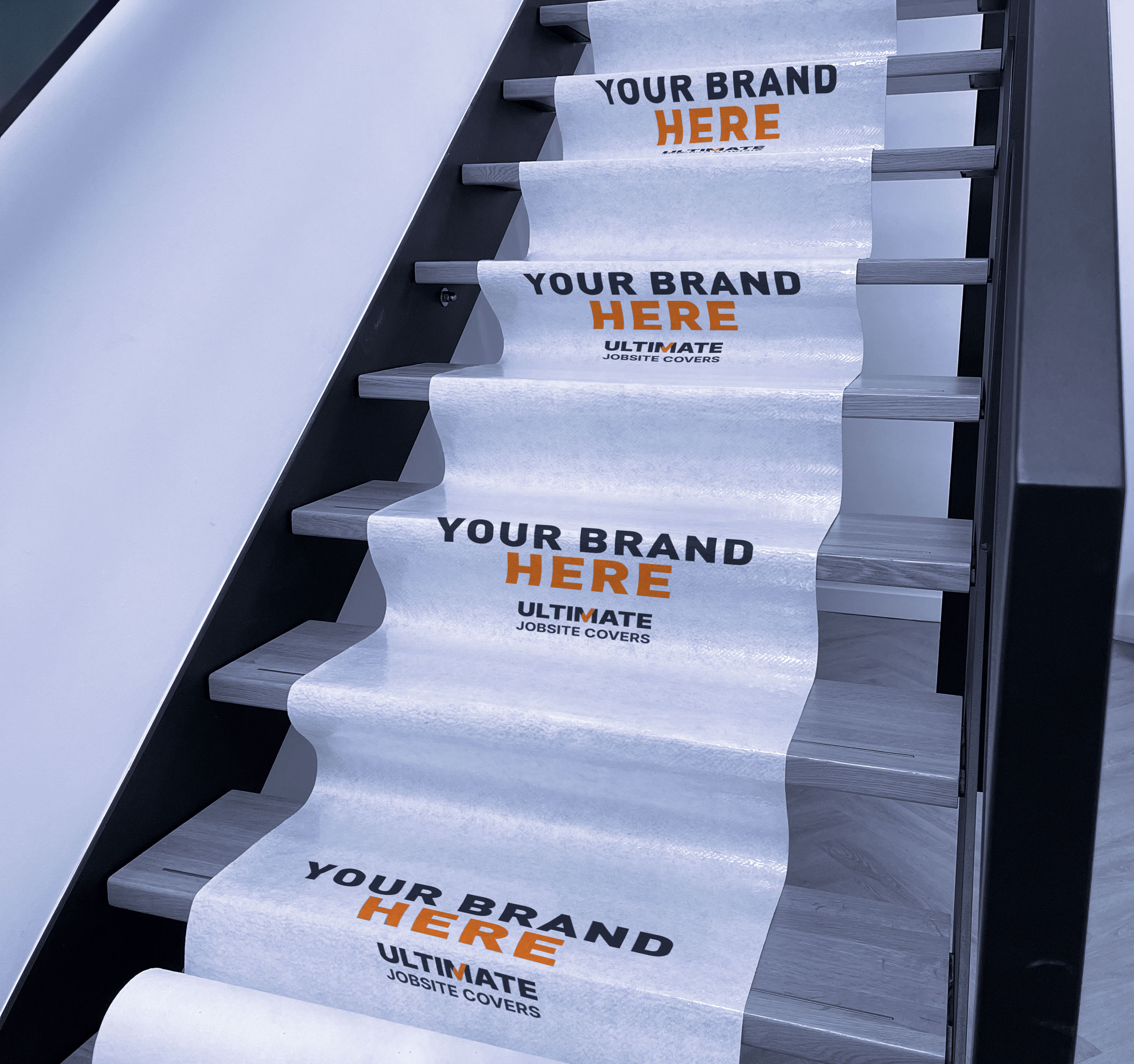 Branded floor protection installed on stairs
